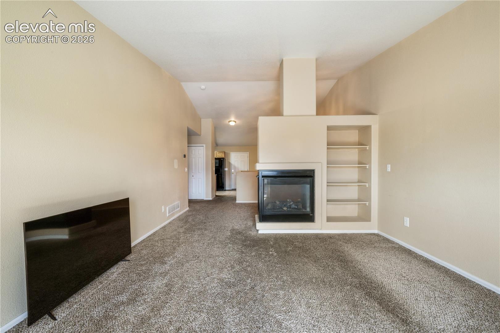 Living room view of gas fireplace
