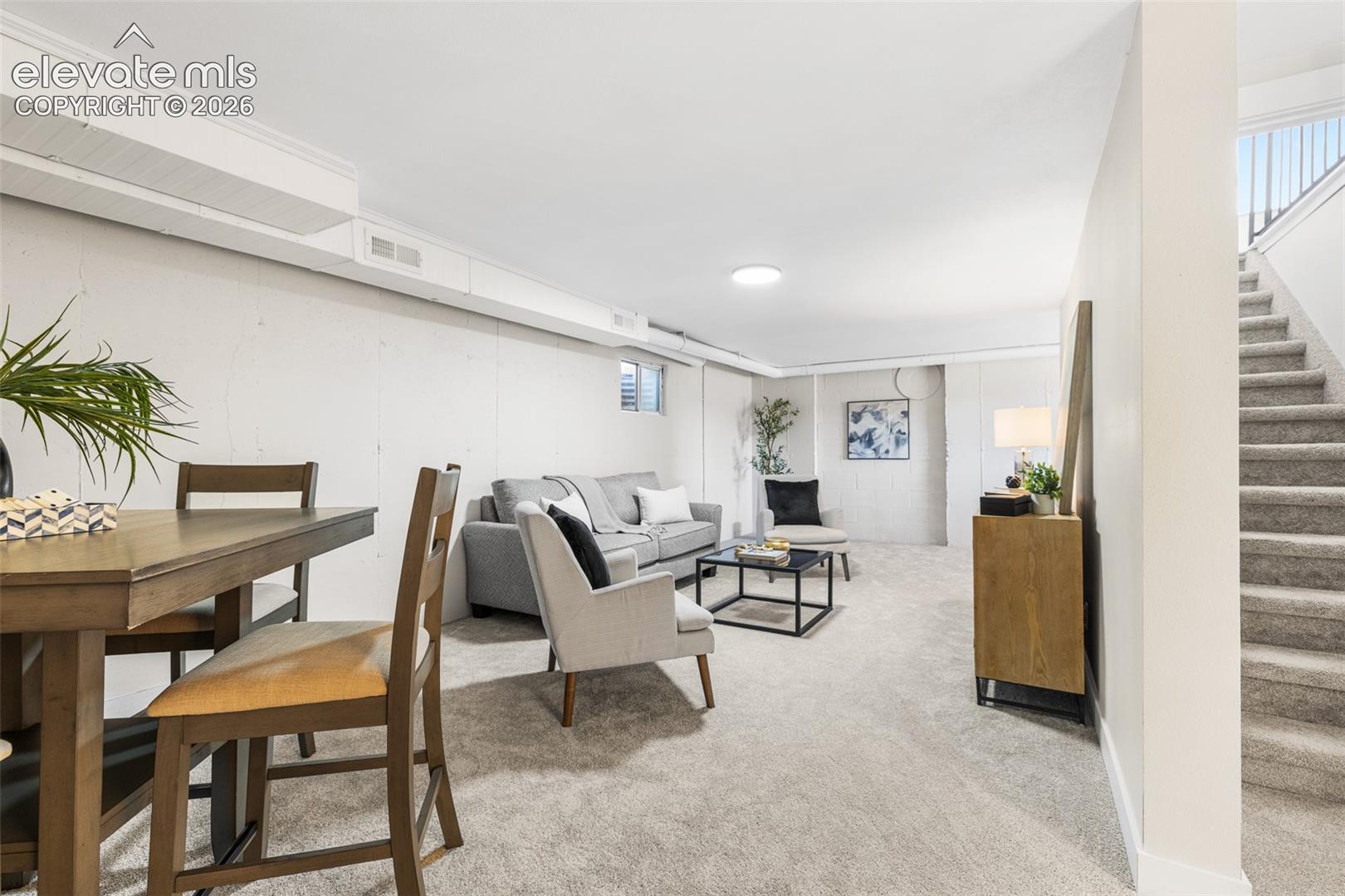 Room to grow in this finished walk out basement with new carpet, paint and a new bathroom