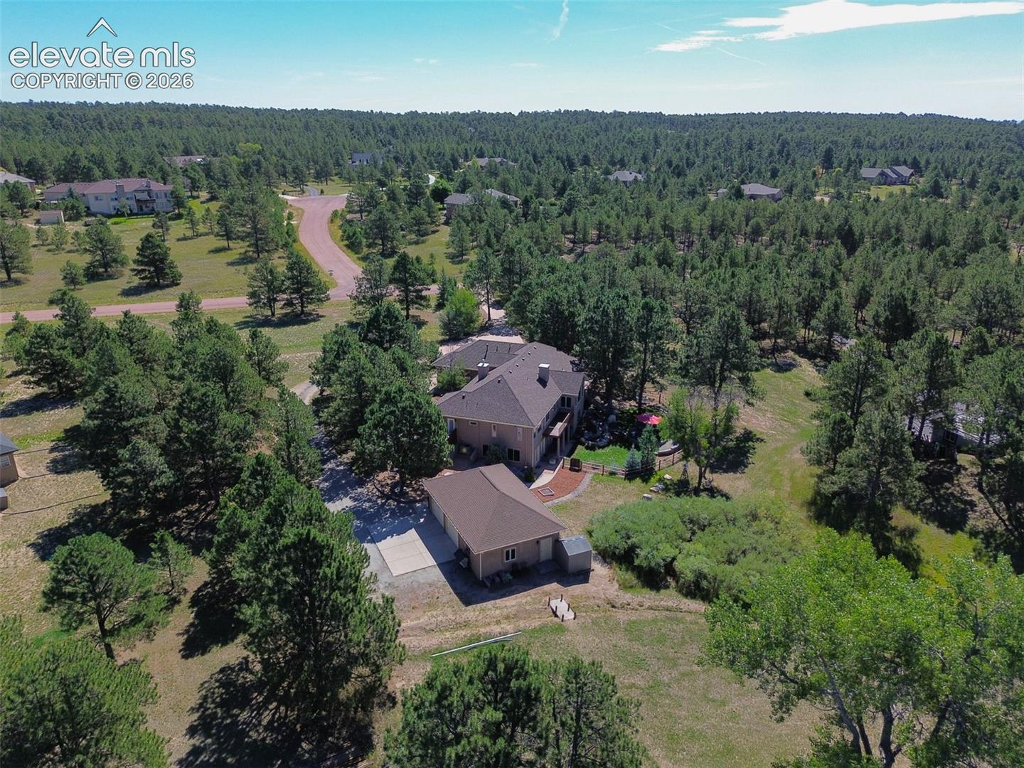 Tucked within the trees but with easy access to major shopping, groceries, gas, and more! 