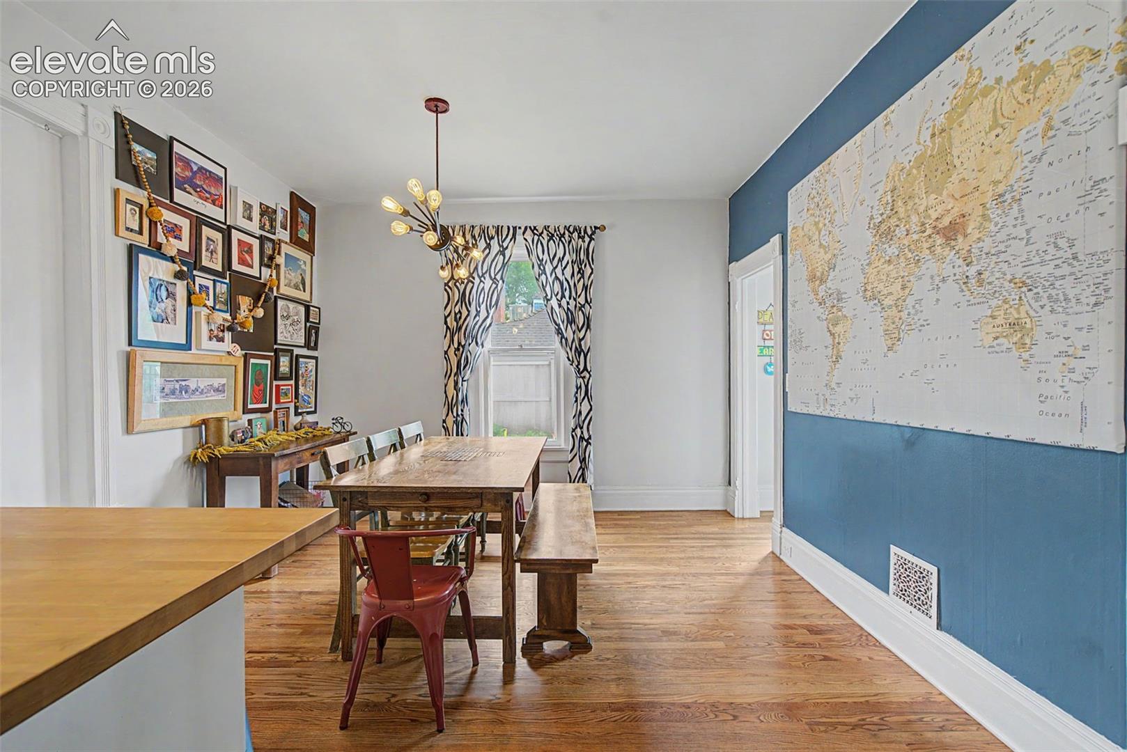 Dining area featuring hardwood flooring