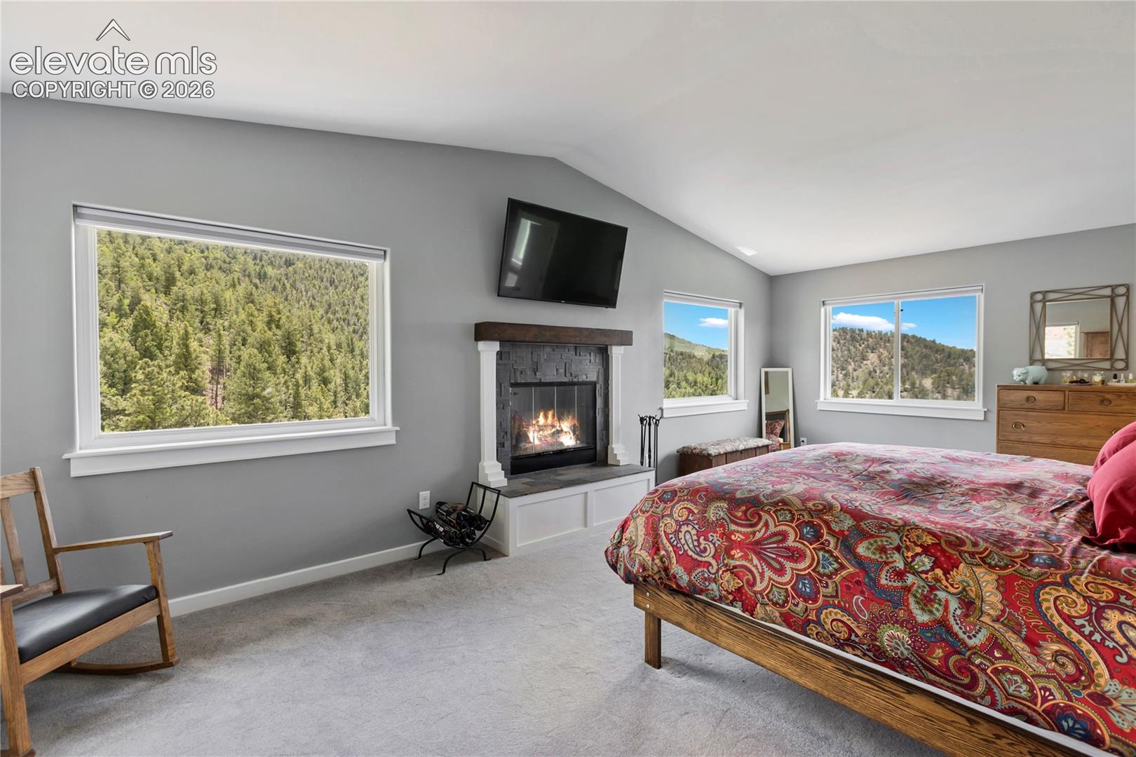 Primary bedroom with views from every window!