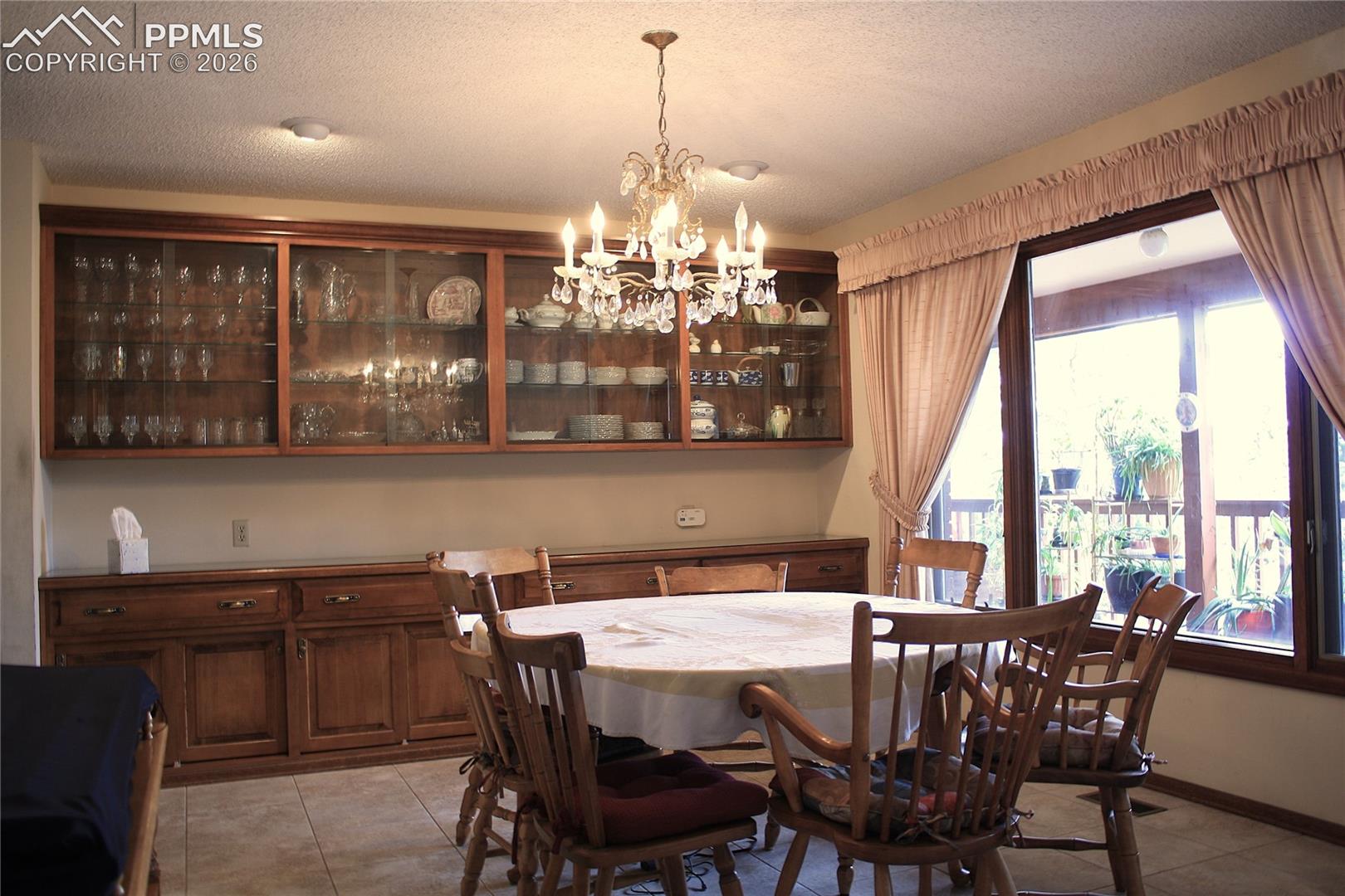 Dining Room with Built in Glass front cabinets
