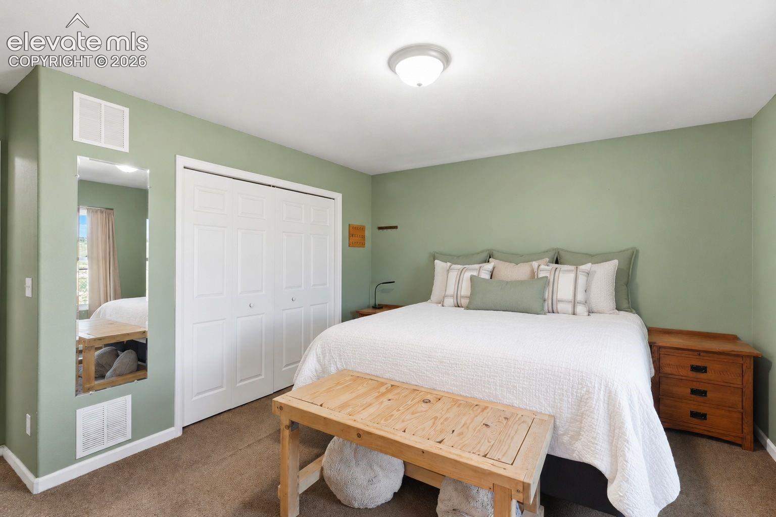 Primary bedroom with full ensuite bathroom.