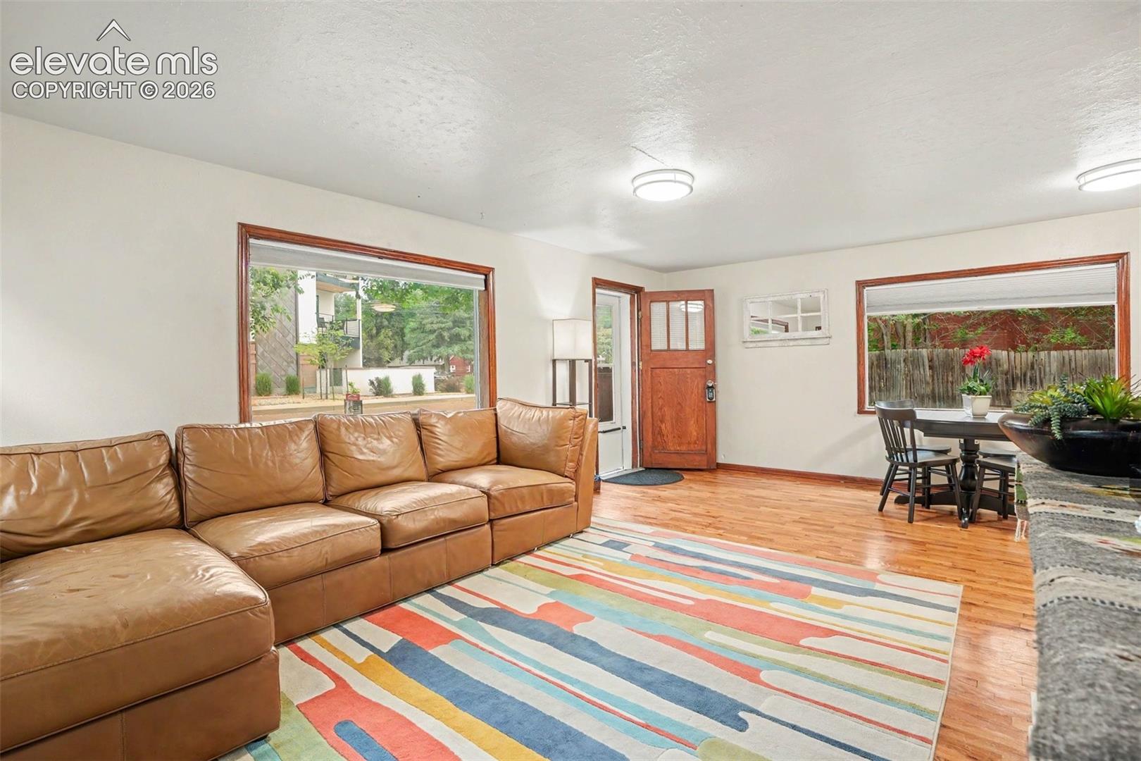 Light and bright living room with real oak hardwood floors.