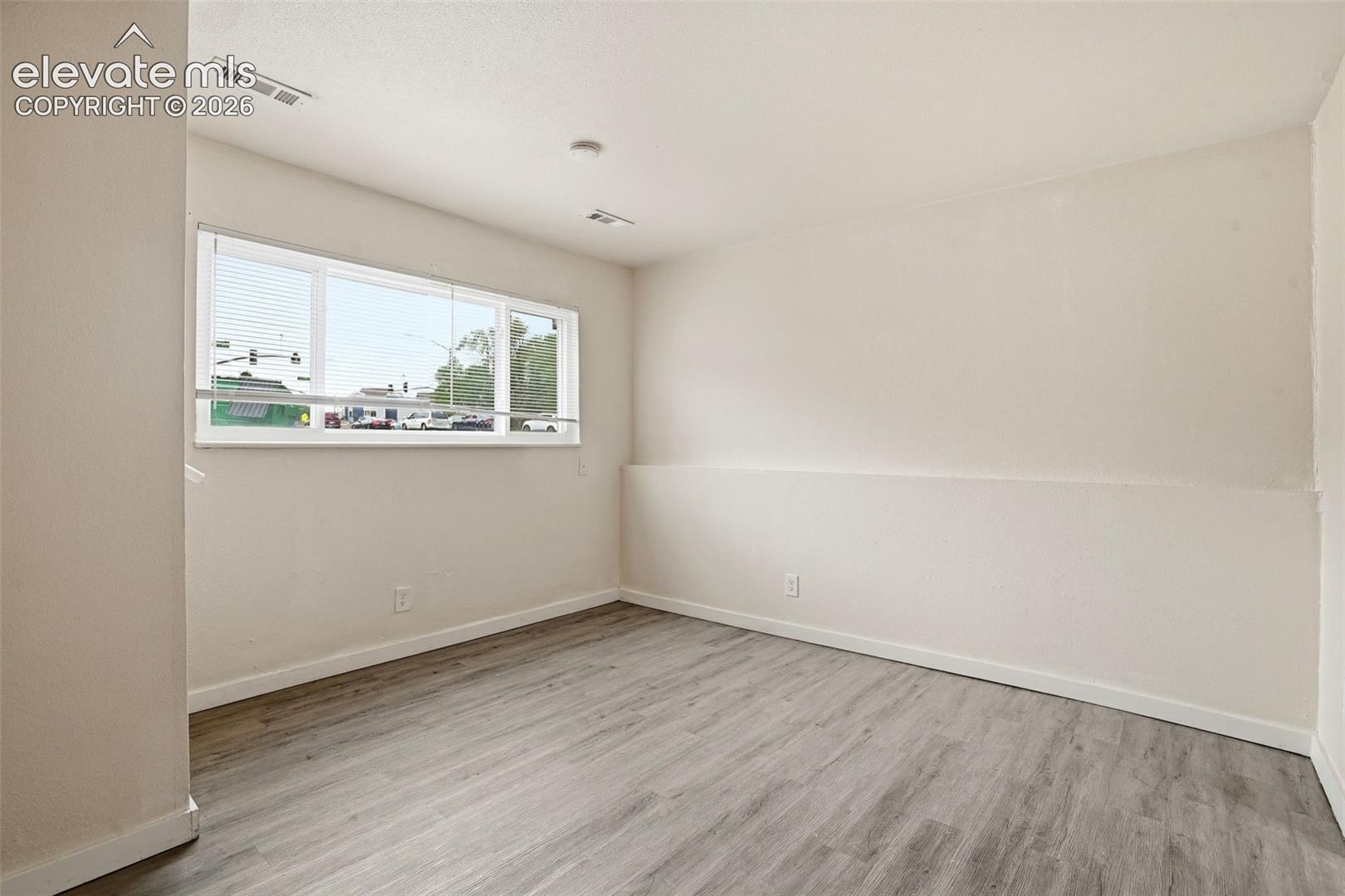 Vinyl Plank Floors and Fresh Paint in the Living Room