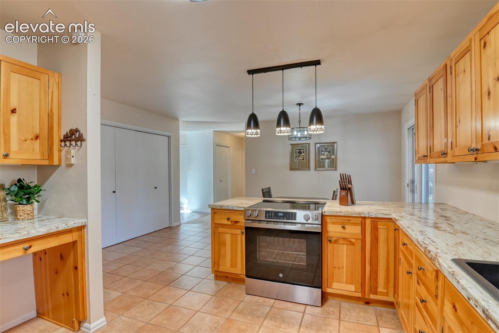 White doors to the left are part of spacious pantry
