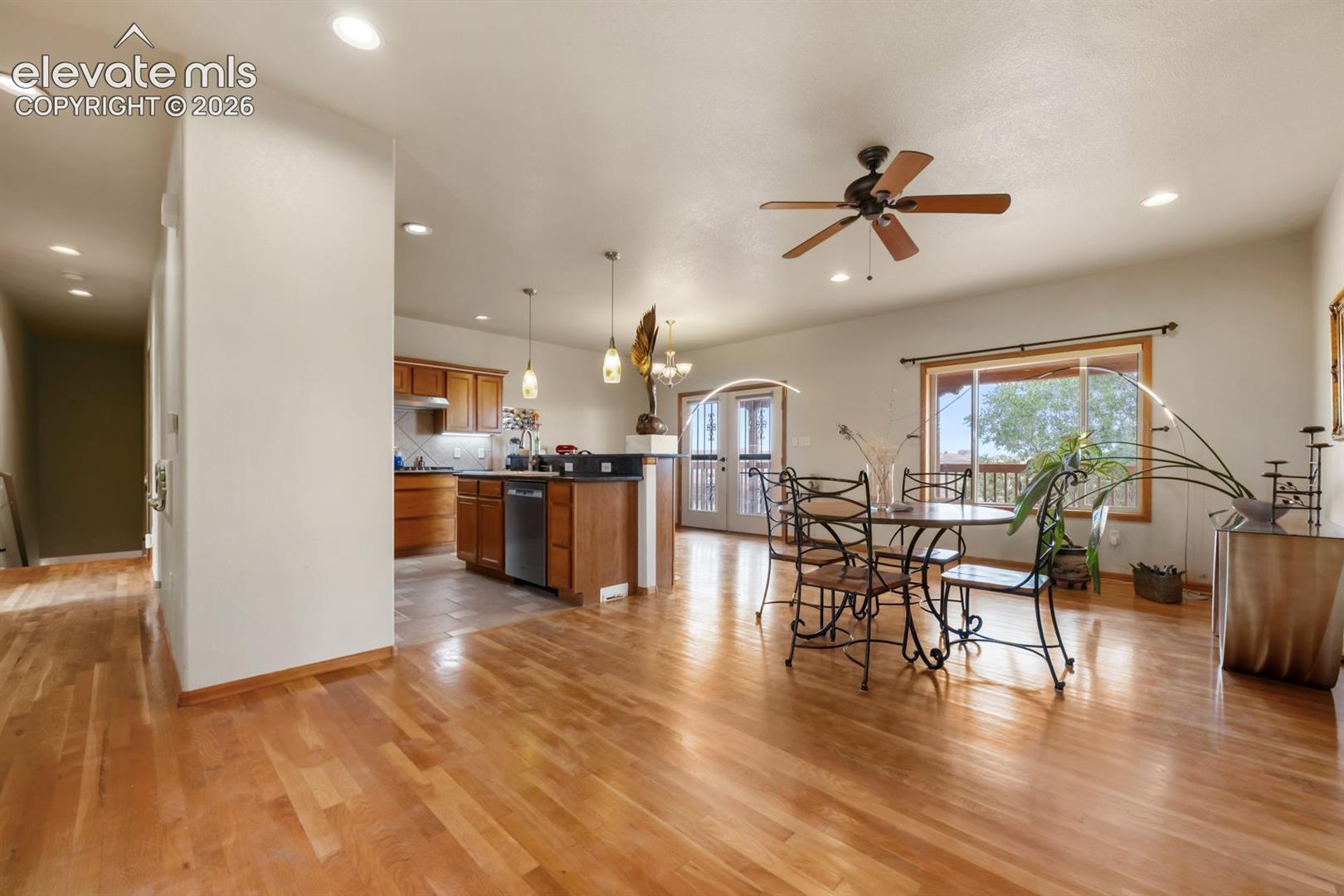 Multiple ways to to arrange your upper living space.  Down the hall to the left is the primary and stairs to lower level.