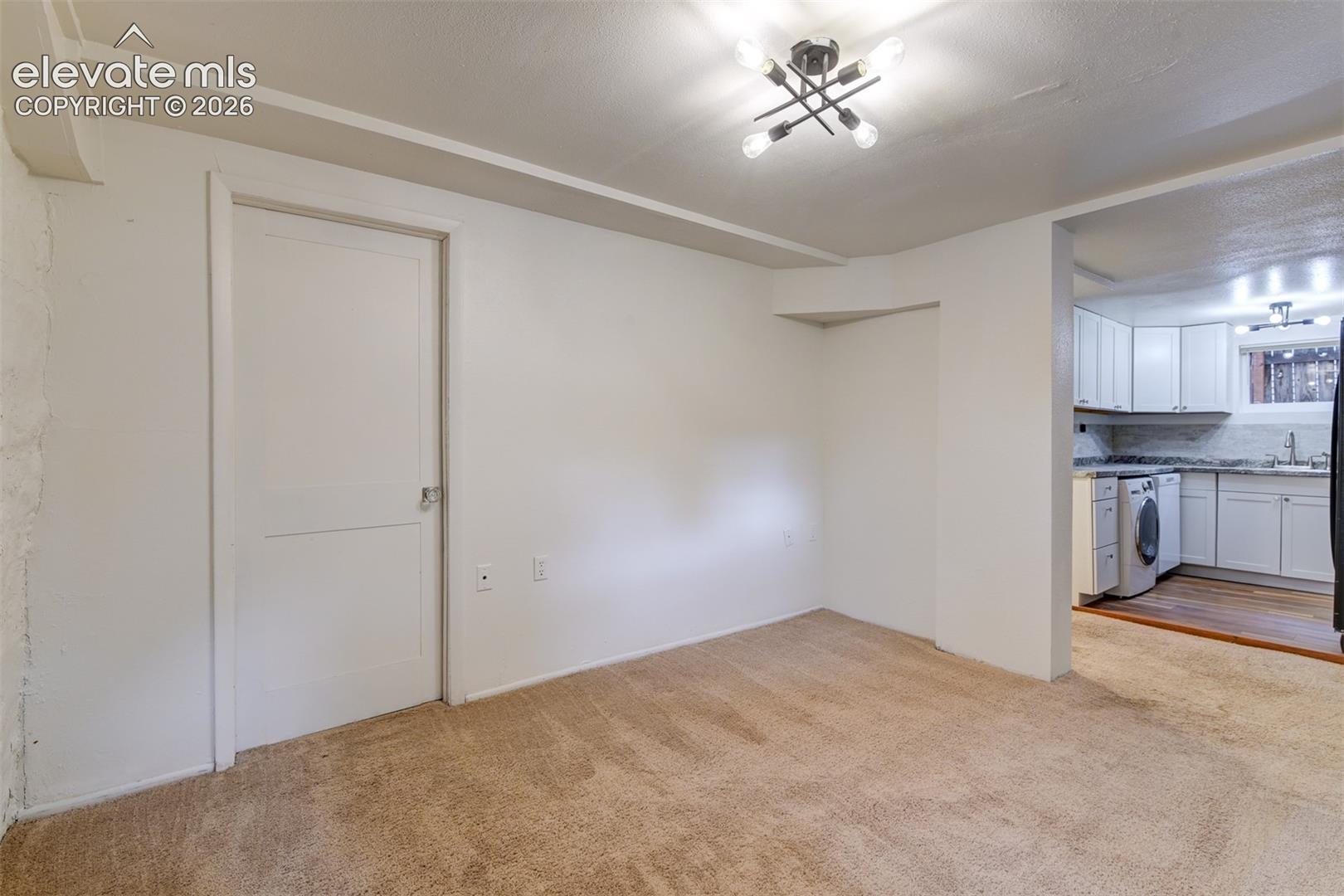 Basement unit located in the back of the property 