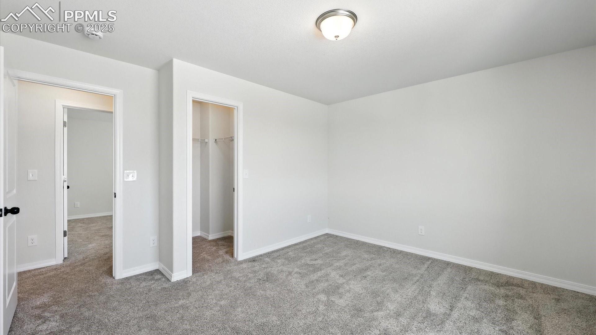 Upper Level Bedroom #2 has a walk in closet.