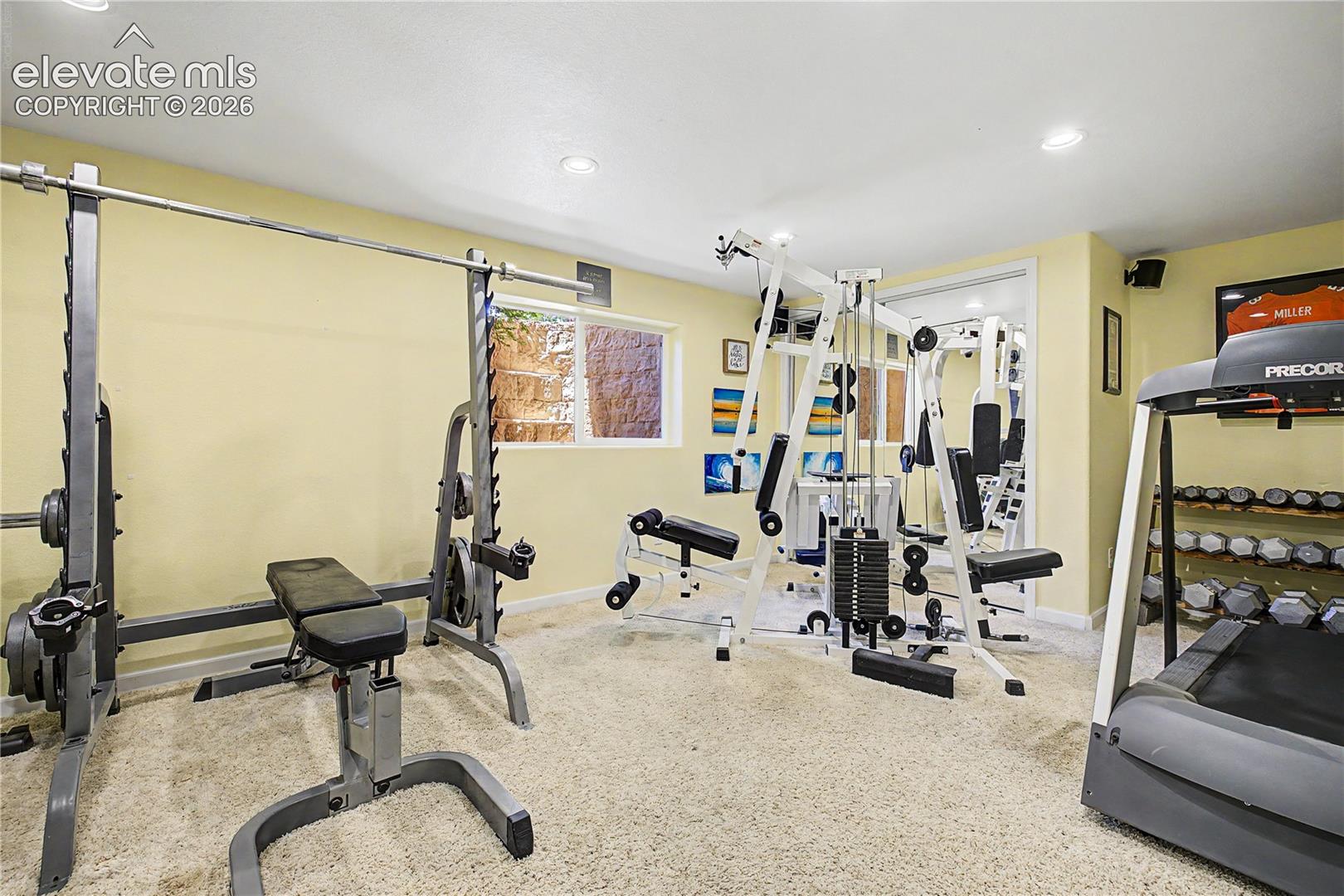 The lower level also includes a private home gym, giving future owners flexible space for fitness without leaving the house.
