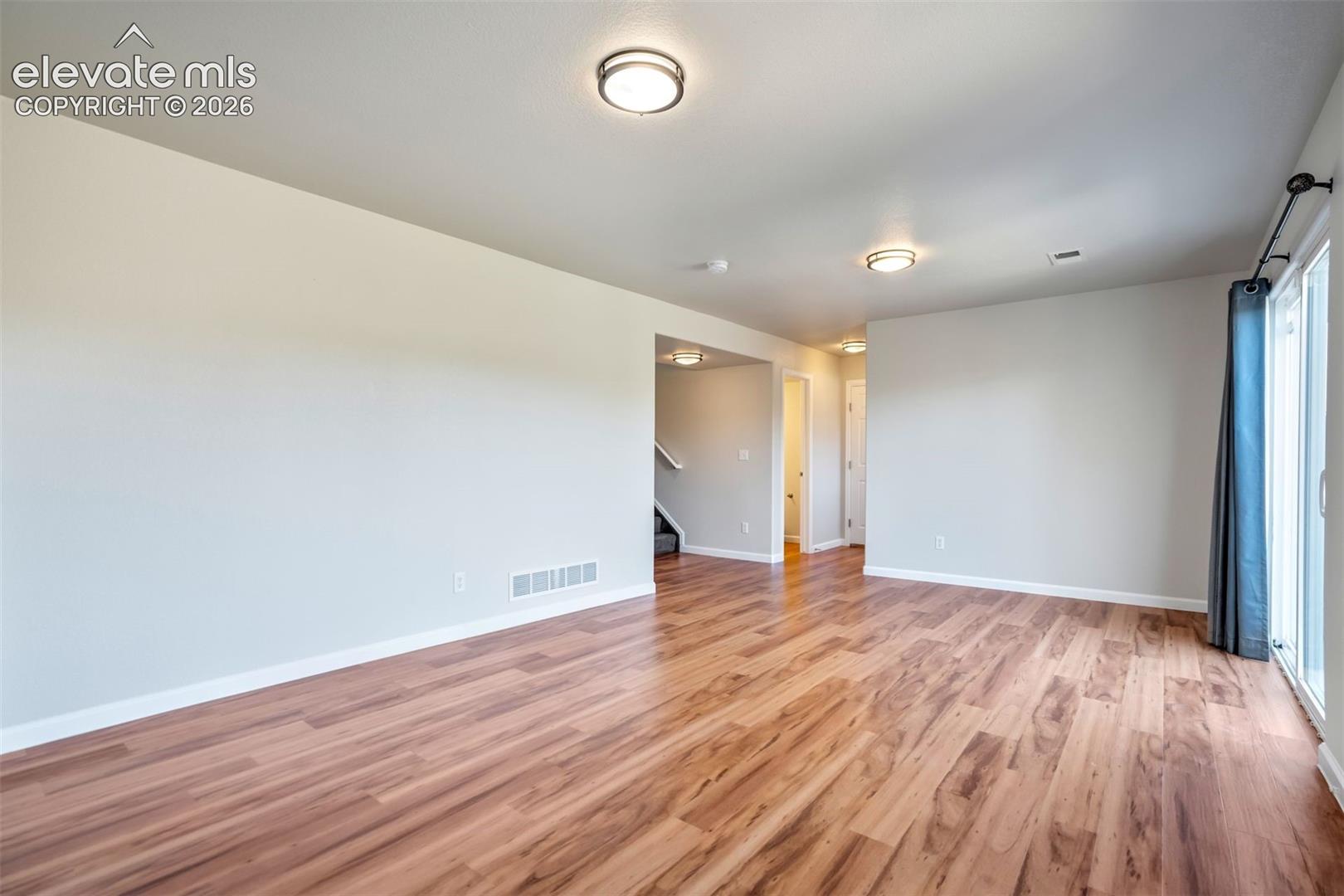 Lower level also gives access to the laundry room, powder bathroom, and 3 car garage. 