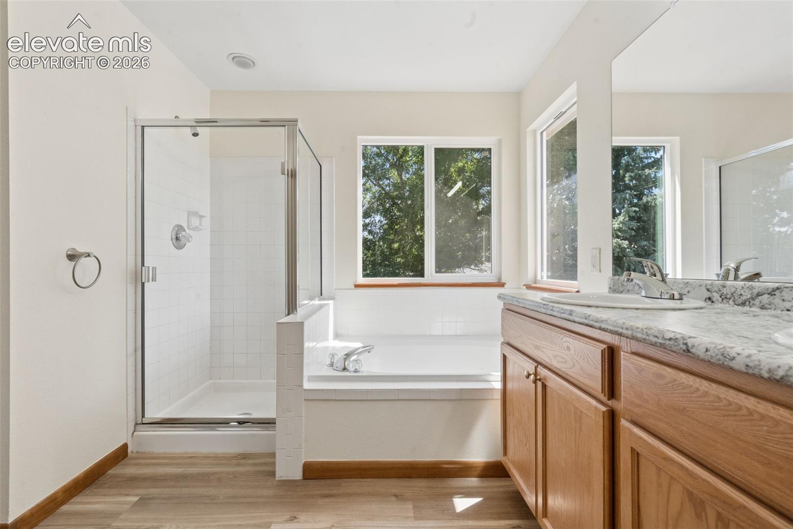 New vanity and countertops and luxury vinyl planking flooring
