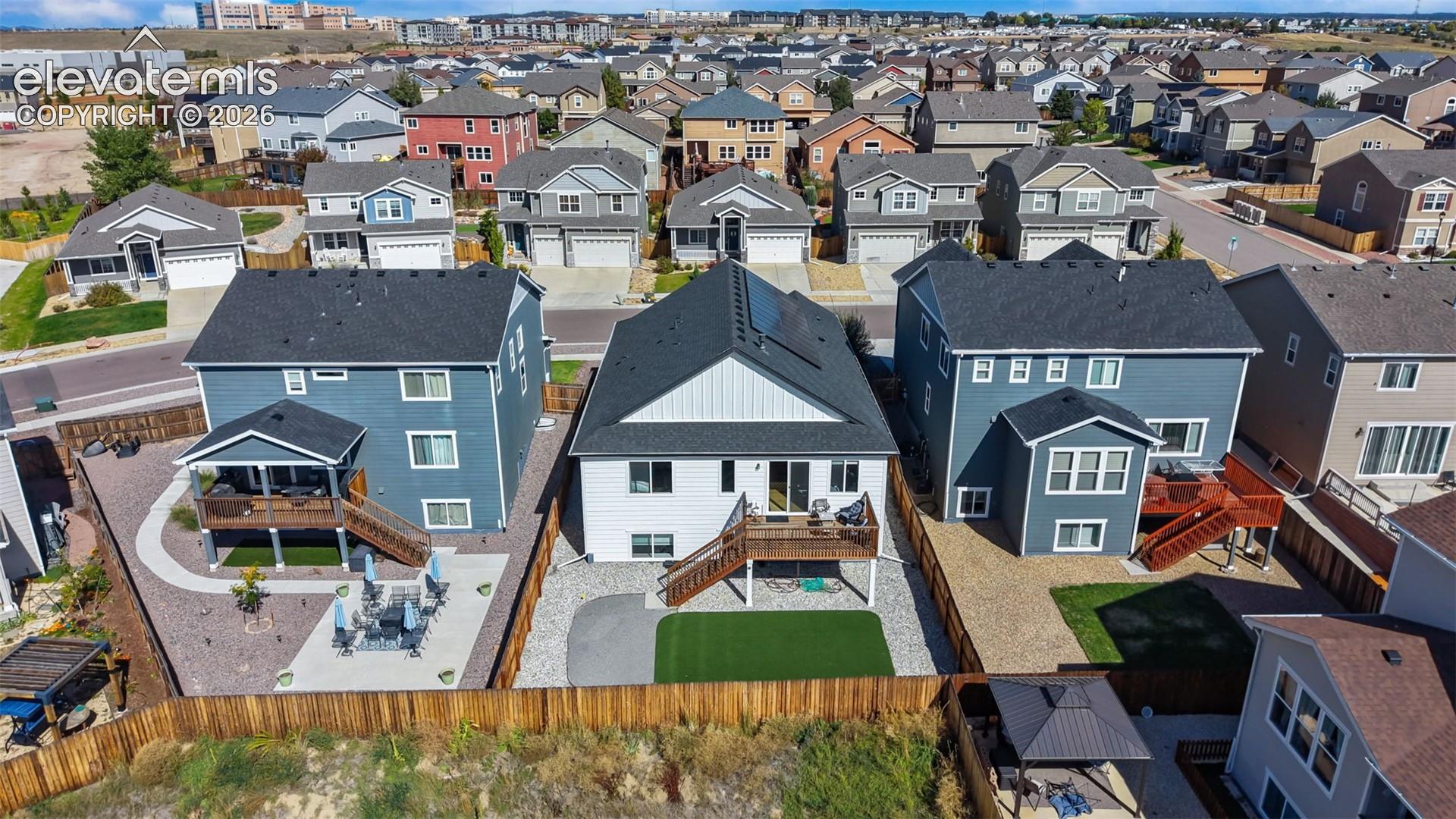 Expansive neighborhood setting featuring numerous residential properties