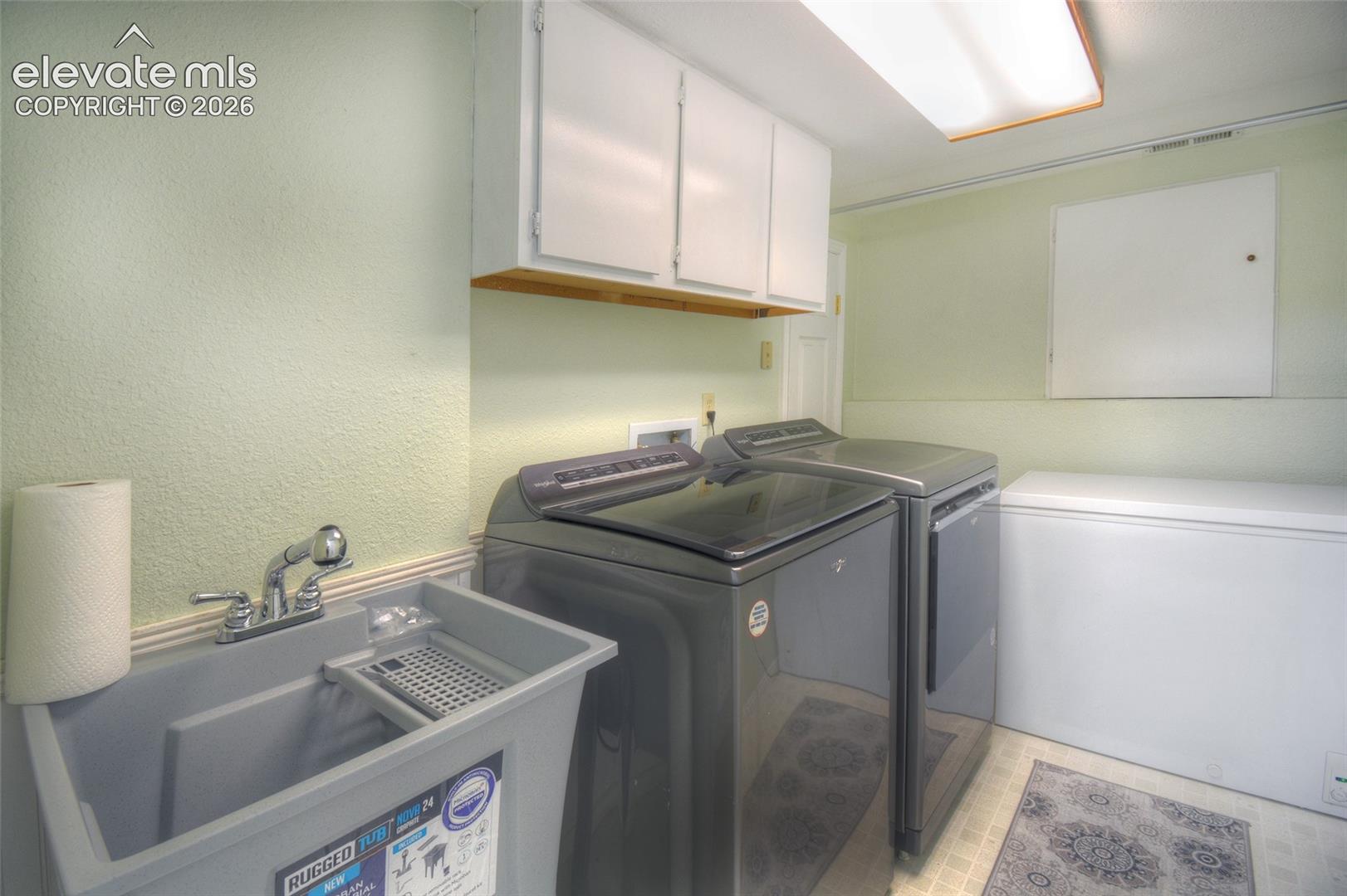 Dedicated laundry room to include a utility sink!
