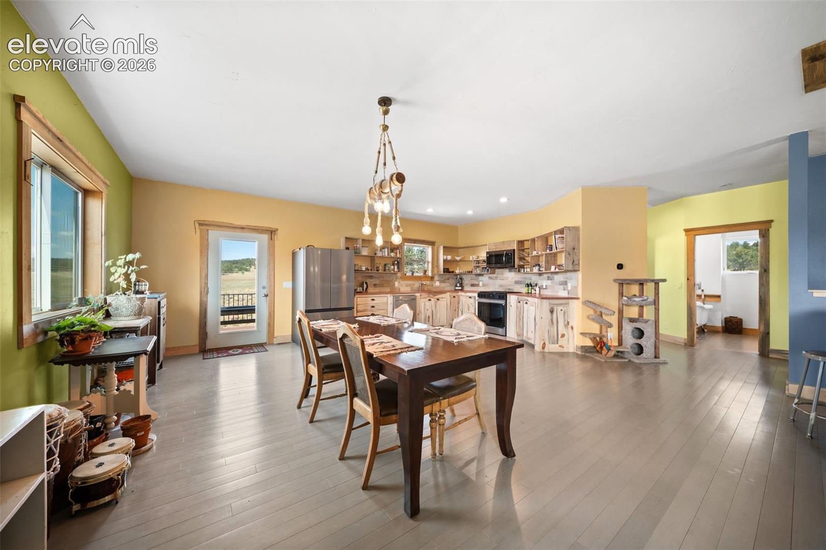 Spacious dining area opens seamlessly to the kitchen.