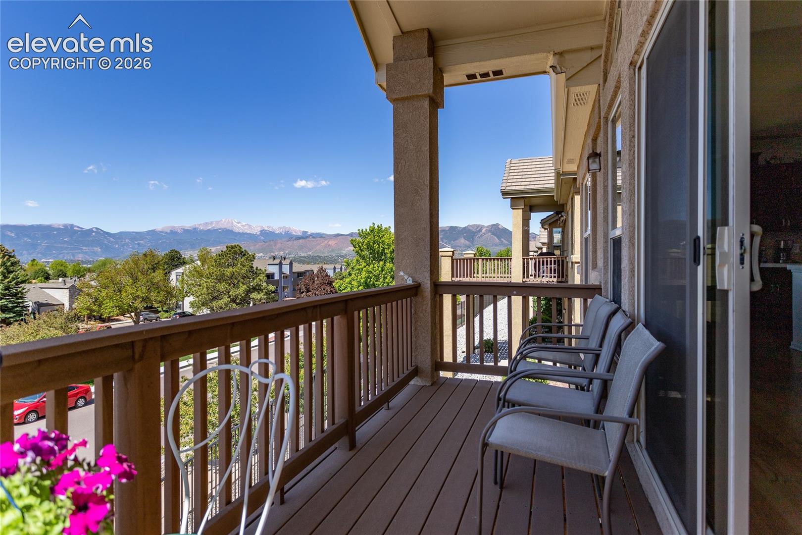 Comfy deck for relaxing, enjoying a meal or just watching your neighbors drive by.