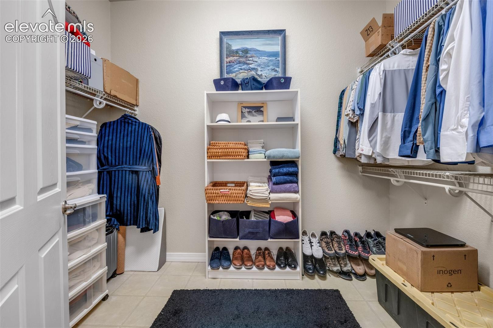 Built-in shelving, wire shelving, and tile flooring