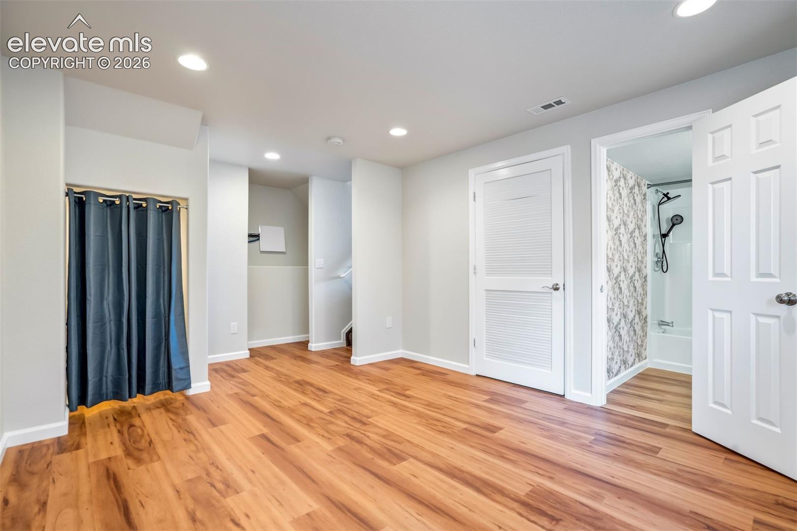 Finished basement with storage space, a full bathroom, and the 4th bedroom. 
