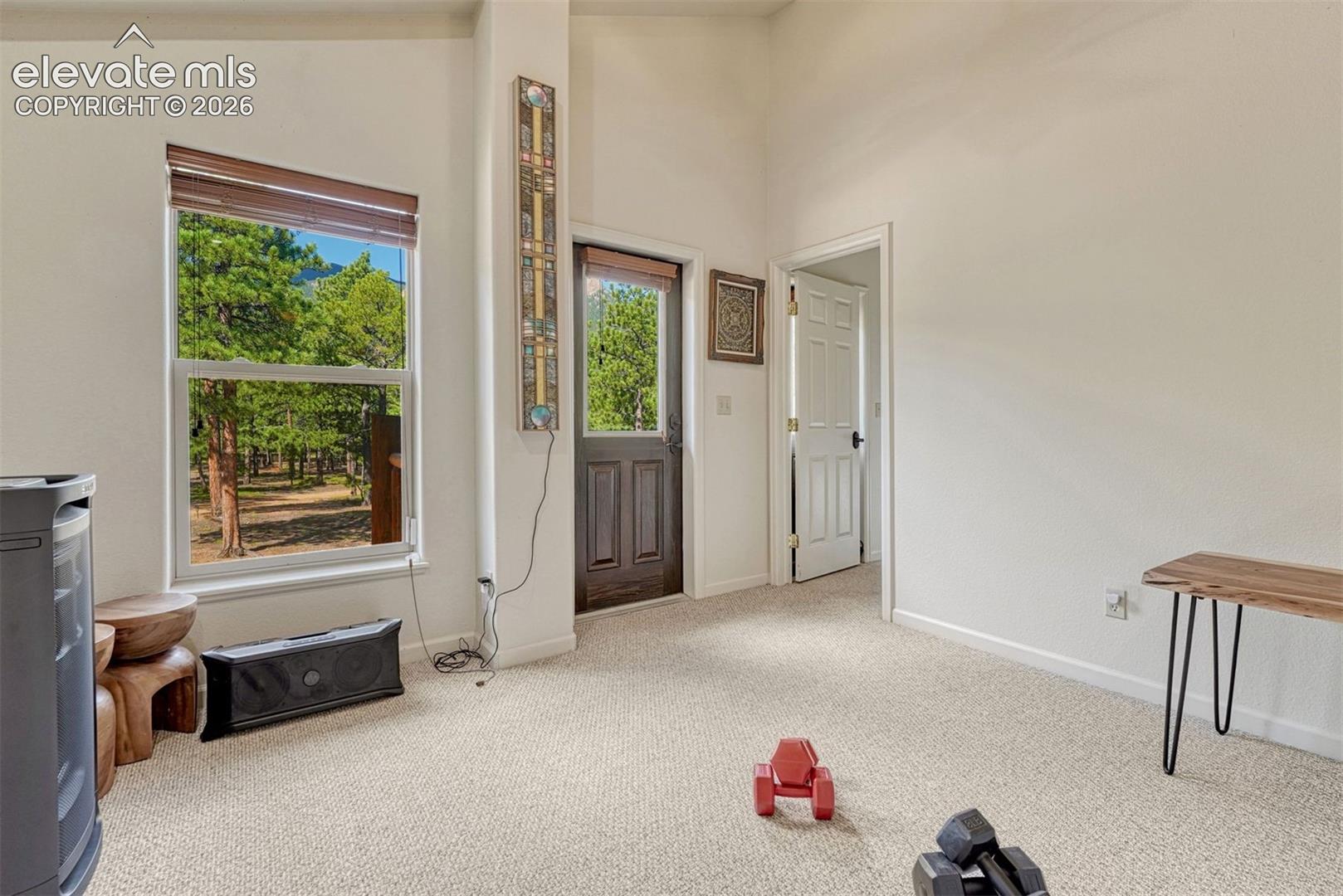 Upper level loft area walks out to balcony