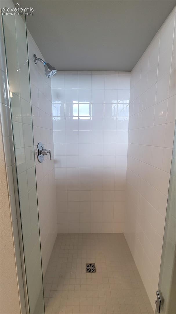 Shower with zero entry, tile surround, at Junior Suite! 
