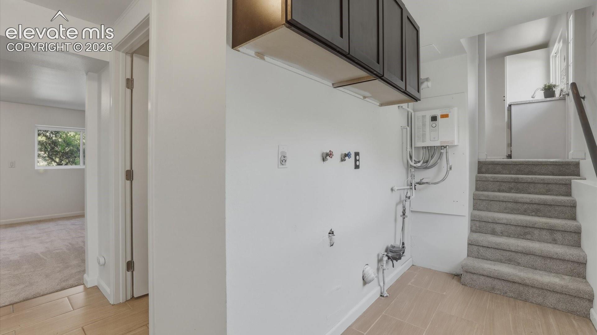 Lower Level Laundry area with hookups for a washer and dryer.