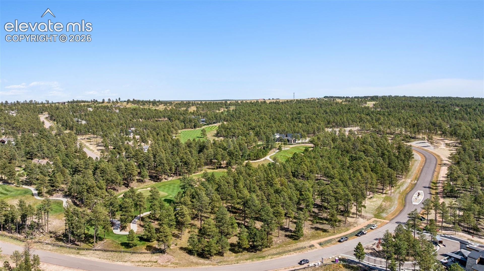 Hole 15 and Horse monument in median.
