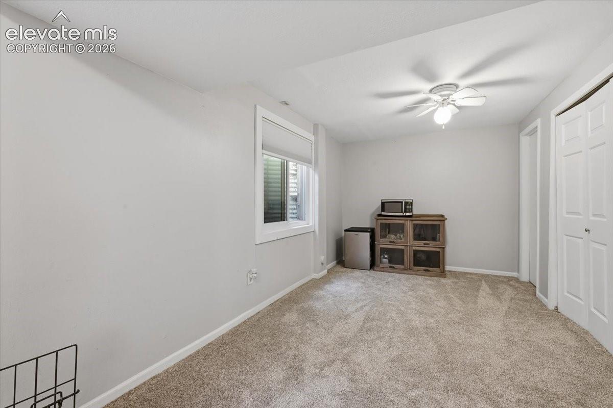 Under stairs storage joins both basement bedrooms. 