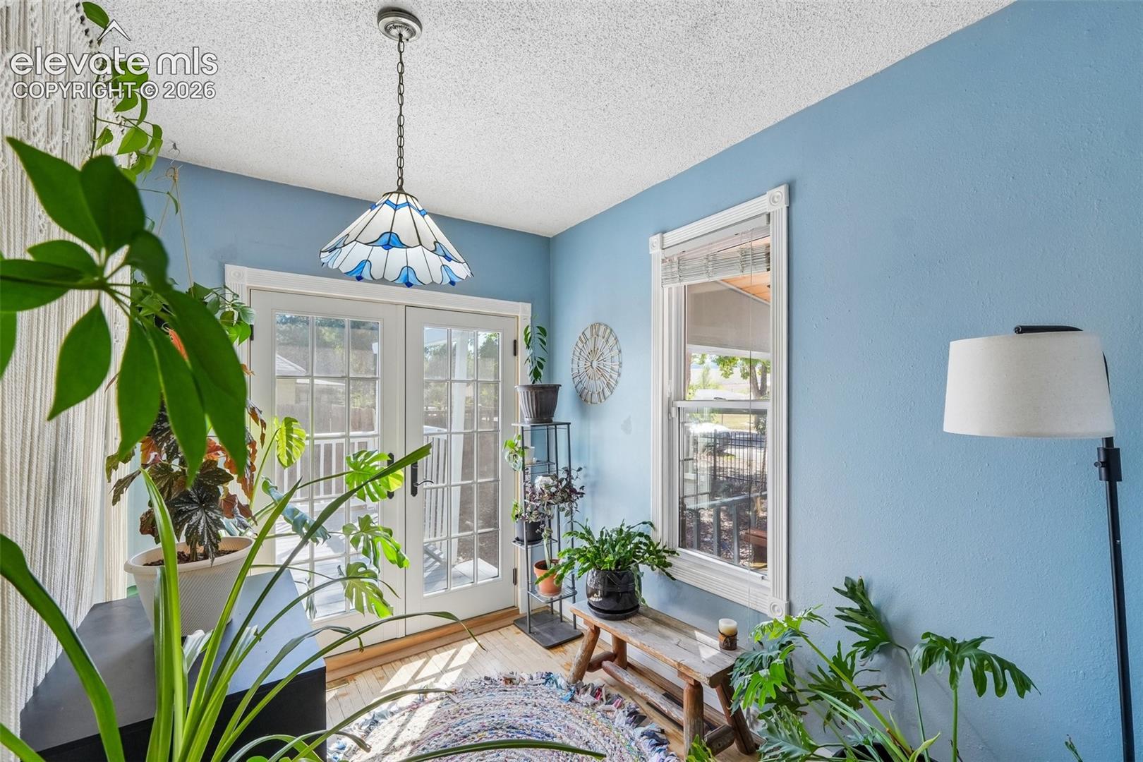 Sun room with walk out to deck