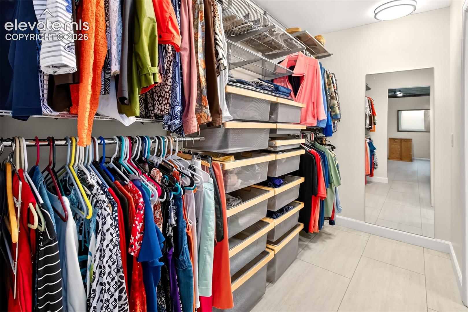 The primary bedroom has buil-ins in the walk-in closet