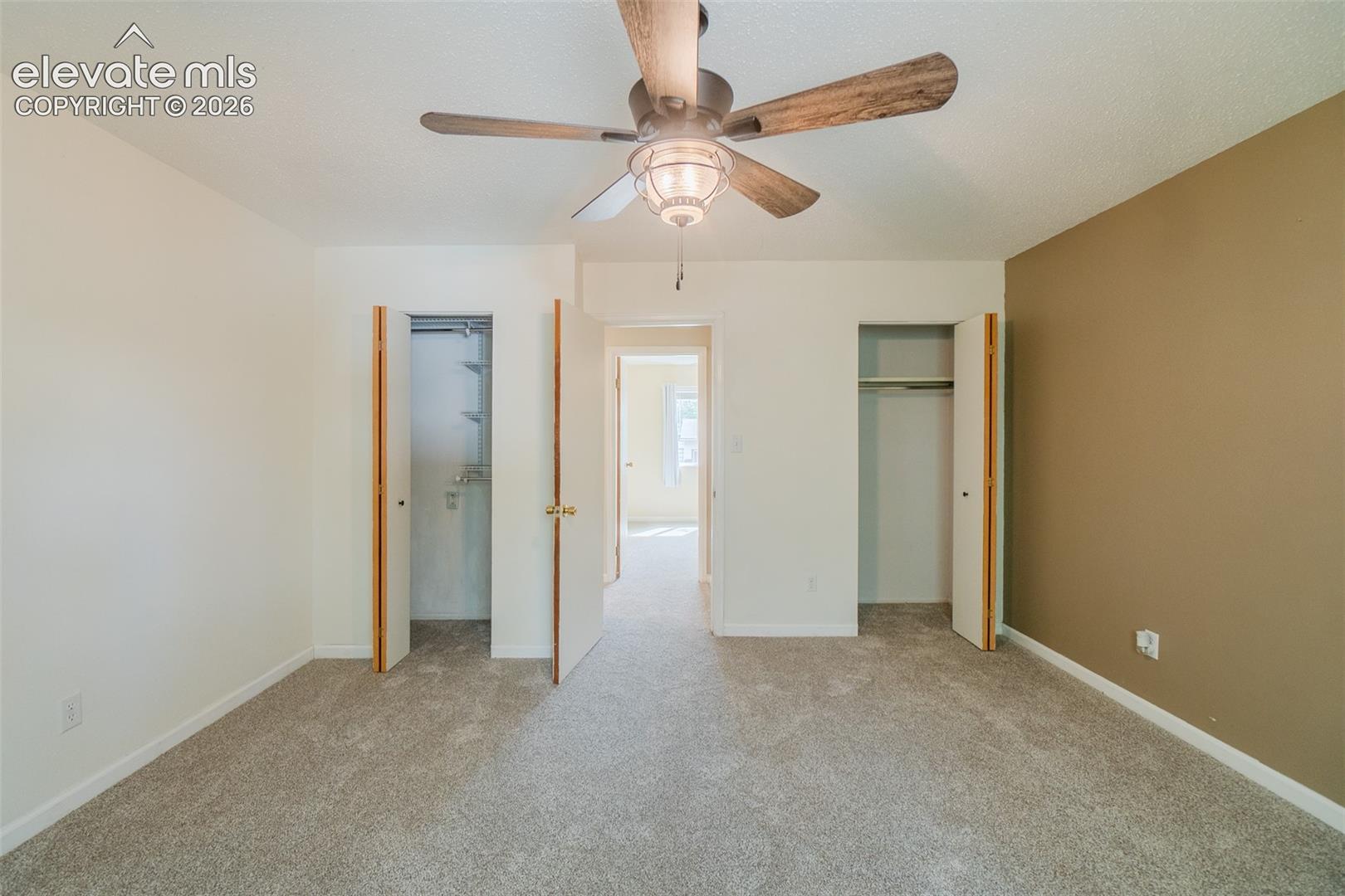 Neutral tone walls and carpeting