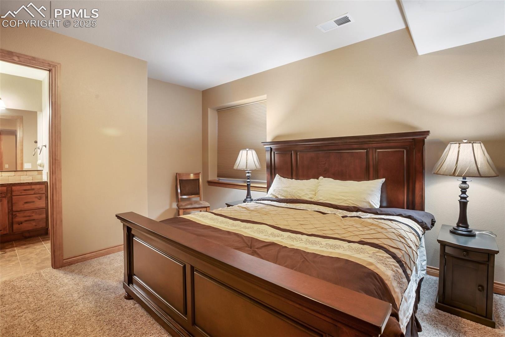 Bedroom in lower level with bathroom on suite 