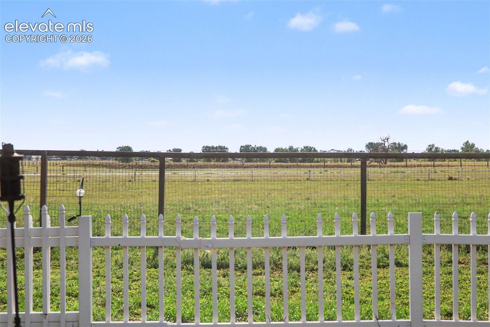 Peaceful views of the surrounding open space create a beautiful sense of privacy and tranquility.