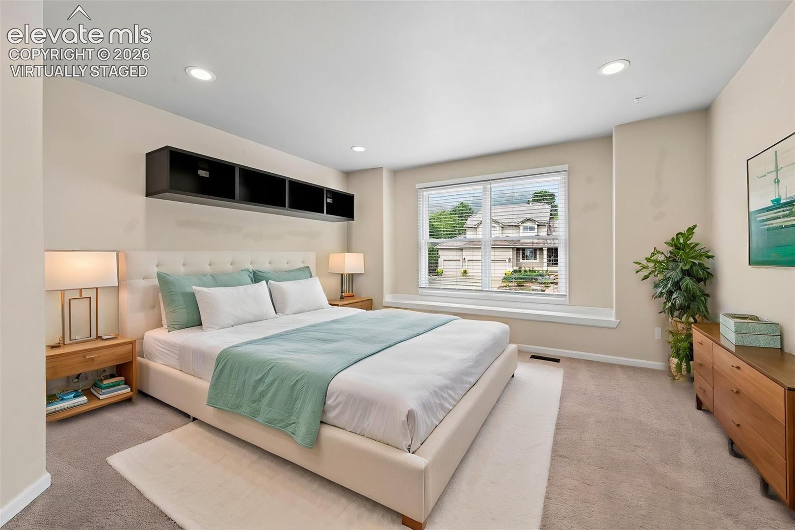 Virtually staged bedroom with incredible views of Cheyanne Mtn