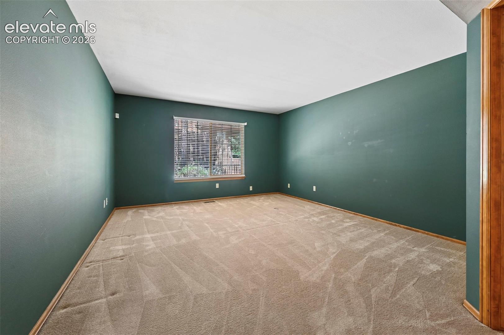 Main level bedroom w/ adjoining bath