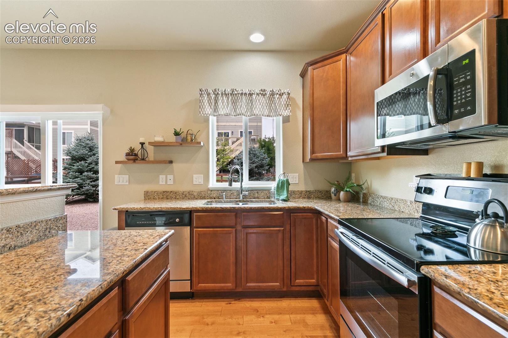 Kitchen featuring stainless appliances and granite countertops