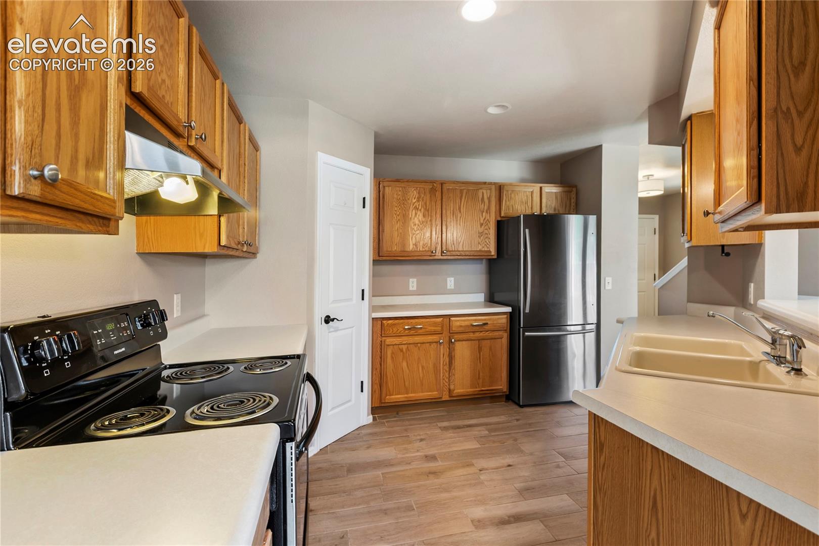 Open kitchen, recessed lighting. 