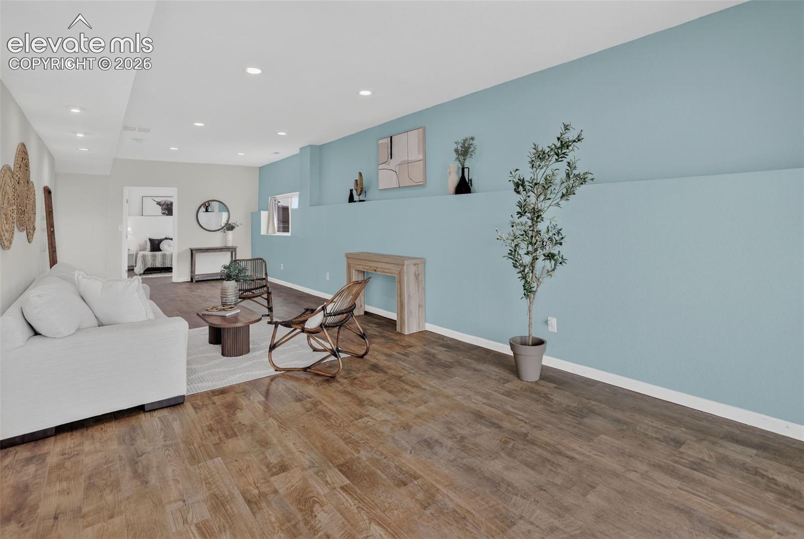 Downstairs, large family room, game room or home theater.  Make it your own.