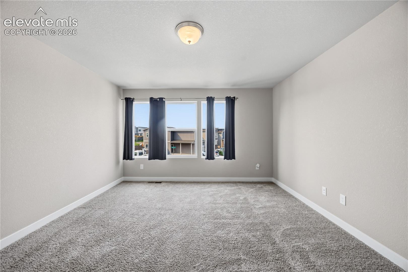 Upper Level Primary Bedroom.
