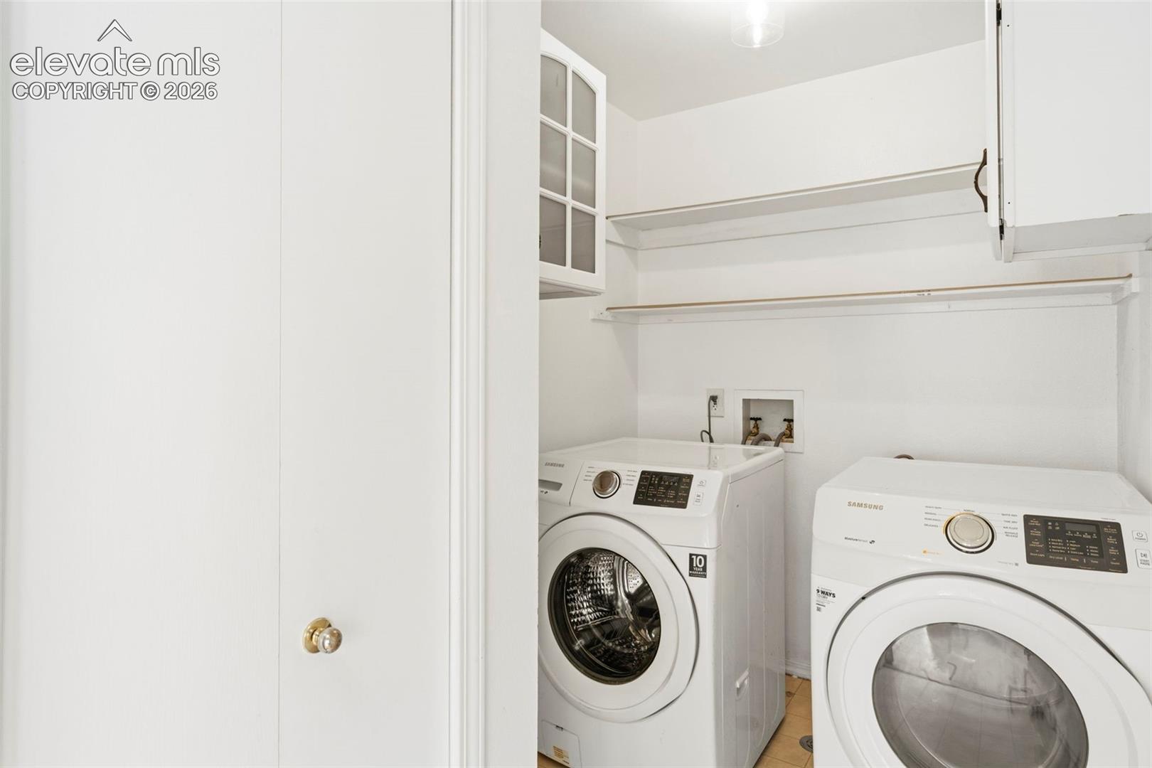 Main level laundry w/ broom closet, cabinets, and garage access. W&D included!