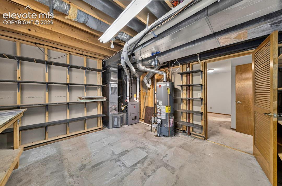 Lots of shelving and storage plus crawlspace storage!  Optional 2nd kitchen location, craft room or office possibilities.
