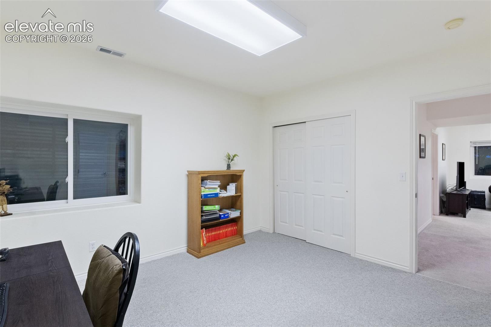 Basement Bedroom 4 currently used as office 