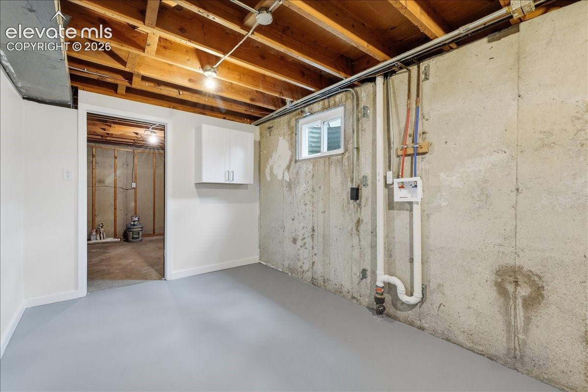 Laundry area and huge storage room.