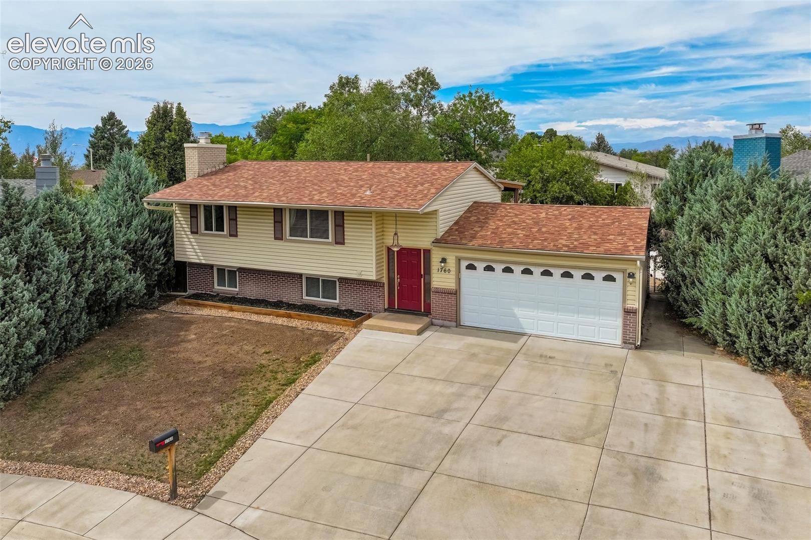 If the backyard doesn't sell you, the oversized garage and driveway might. If they don't, we're going to need to talk.