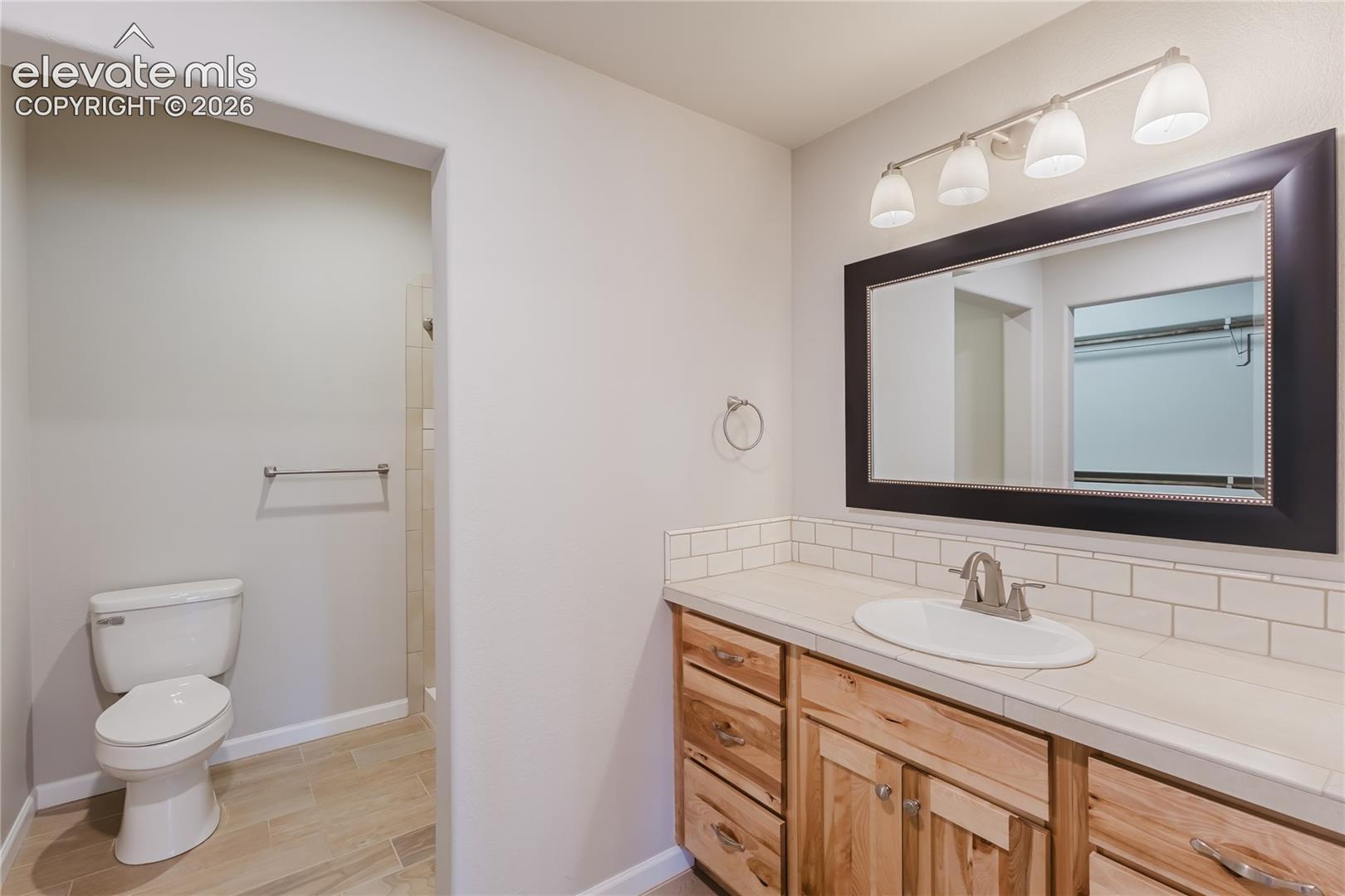 Attached bath to basement bedroom