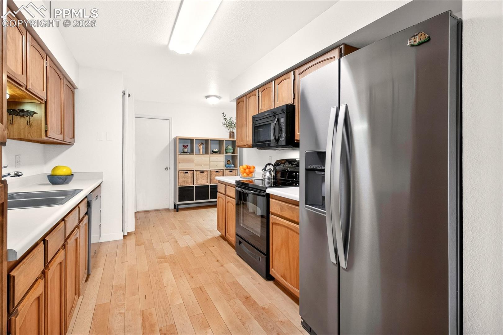 Spacious kitchen with double sinks.