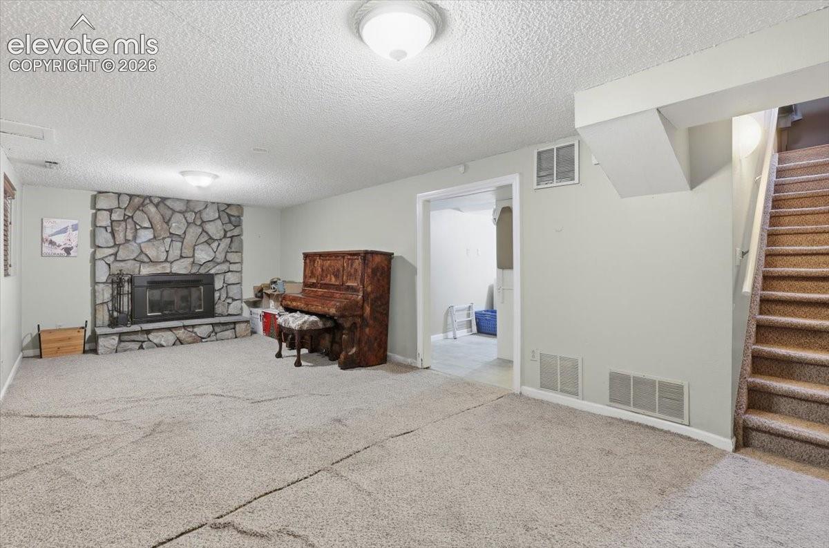 Basement family room with fireplace