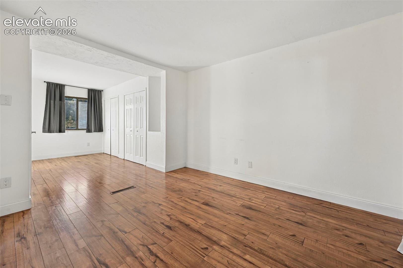 Primary bedroom with separate sitting room and lots of closet space 