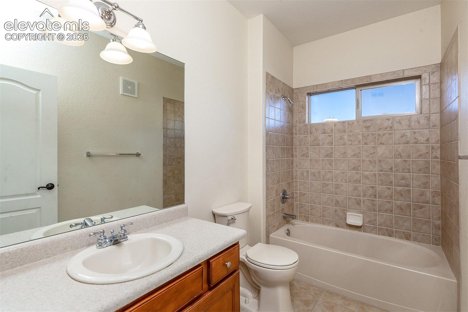2nd bathroom near laundry and 2nd bedroom