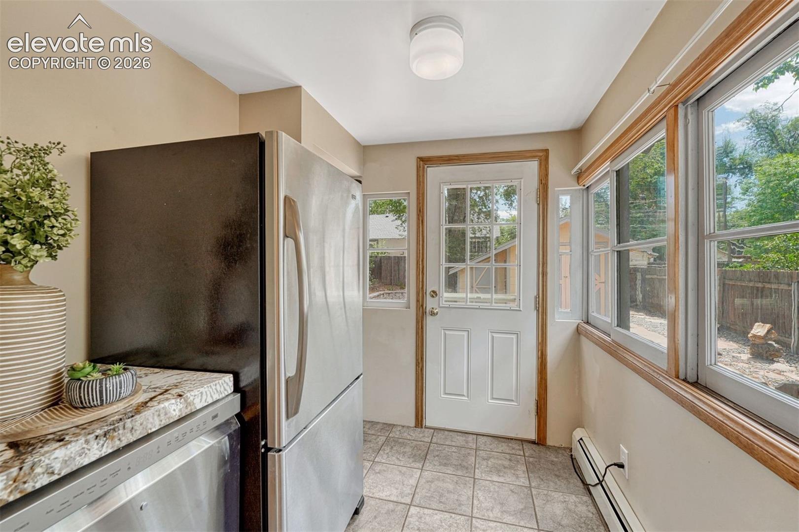 Stainless steel appliances including dishwasher and refrigerator