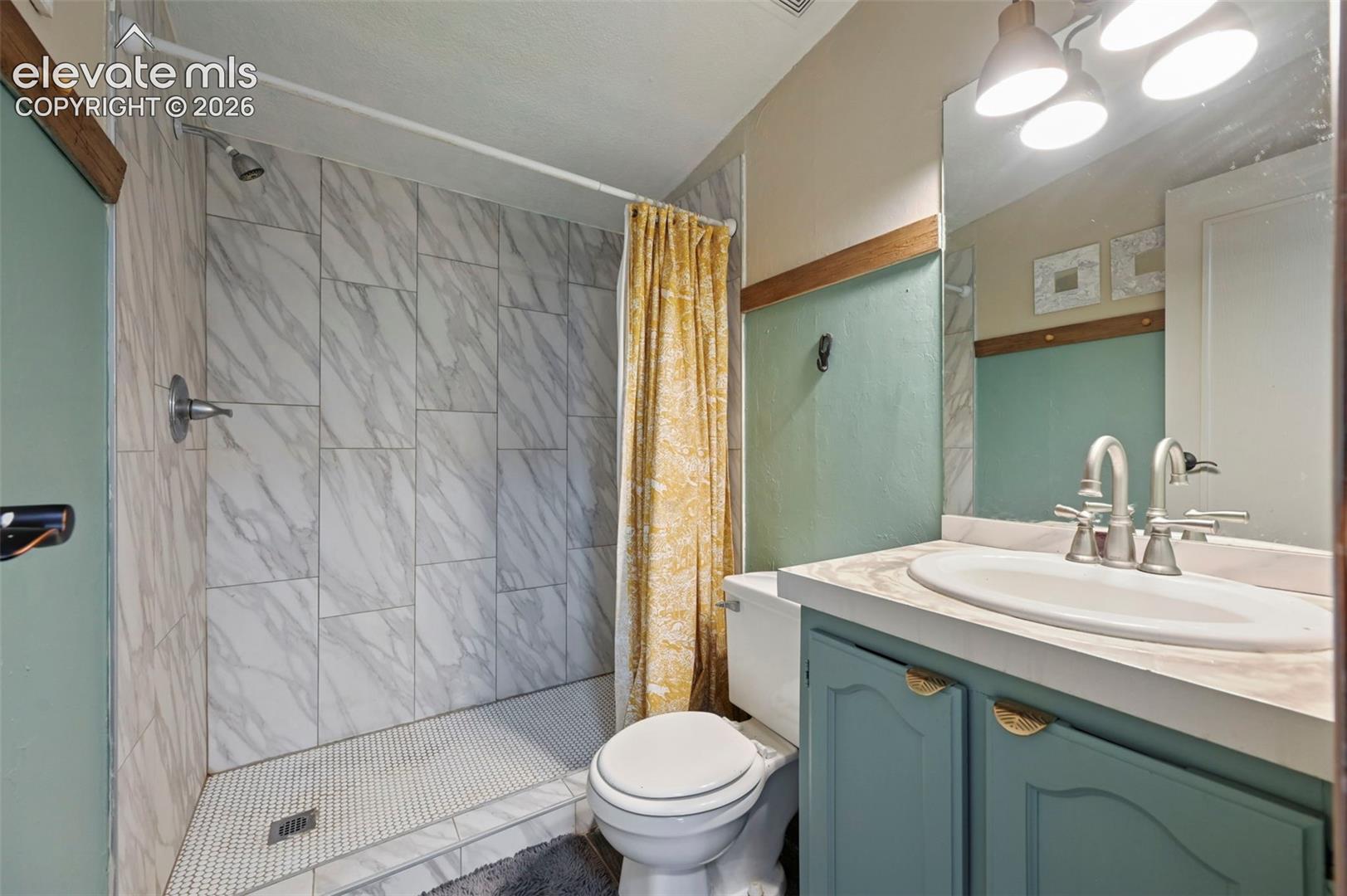 Secondary Bathroom with walk in shower